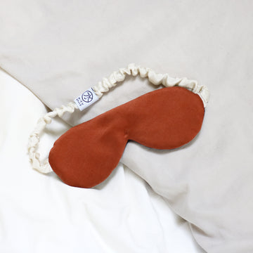 mizu brand silk eye mask in burnt orange charmeuse 